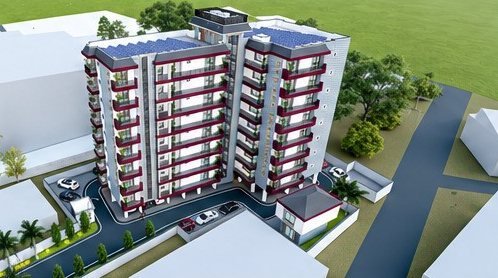 Aerial view of New Era Apartments with rooftop solar panels and internal driveway